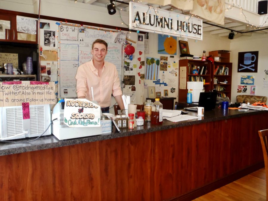 Irene Kate Patron/The Fordham Ram Phil Feinbusch tends the Rodrigue’s coffee couter as one of a dozen baristas who keep Rodrigue’s going.