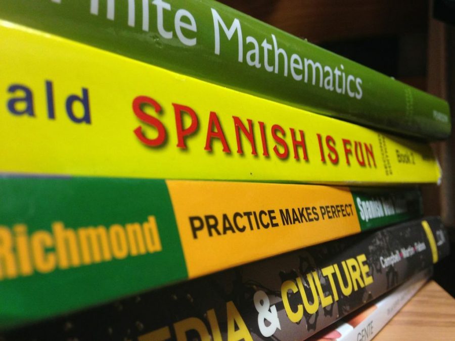 A number of factors affect textbook price, but publishing costs and new editions are two of the primary ones. (Photo by Caitlin Ashley Perniciaro /THE RAM or Courtesy of SITE)