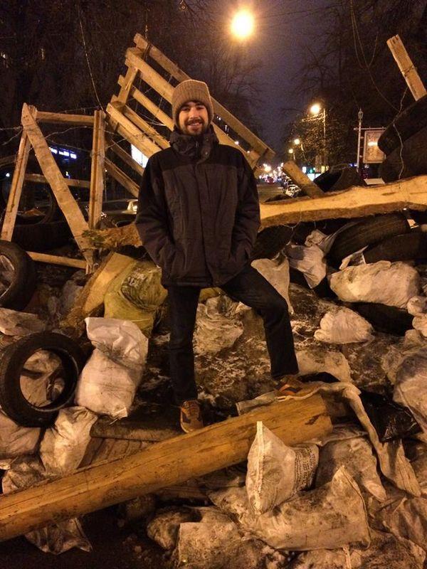 Austin Wood, an American living in Moscow, poses on a barricade in Kiev. (Courtesy of Austin Wood)
