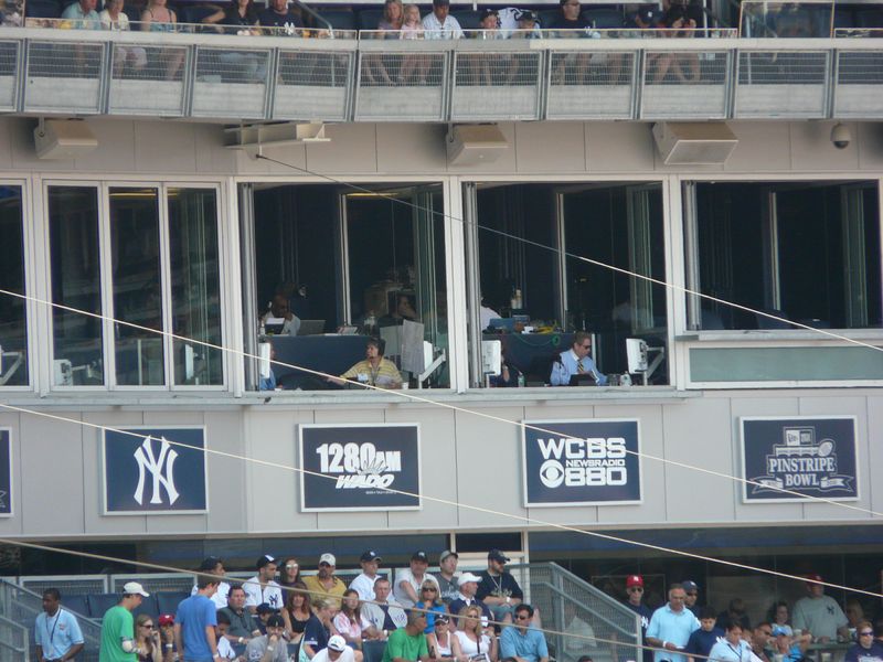 More sports journalists, such as these working at a Yankees game, are working later in life and becoming burnt-out, while a new generation waits for its shot. (Courtesy of JoelRyan/AP)