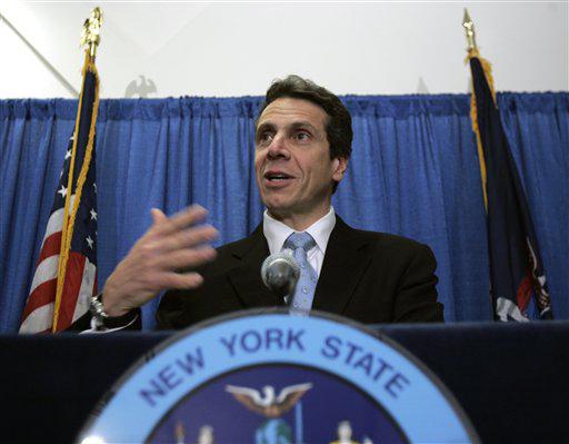** FILE ** In this Thursday, Dec. 11, 2008 file photo, New York Attorney General Andrew Cuomo speaks during a news conference in Albany, N.Y.  If there is anyone who could emerge from the AIG bonus debacle looking good, it may be Cuomo, who has successfully strong-armed the company for details on the millions paid to dozens of executives.  (AP Photo/Mike Groll)