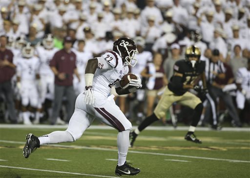 Fordham running back Chase Edmonds (22) carries on a long run during the first half of an NCAA college football game against Army on Friday, Sept. 4, 2015, in West Point, N.Y. (AP Photo/Mike Groll)