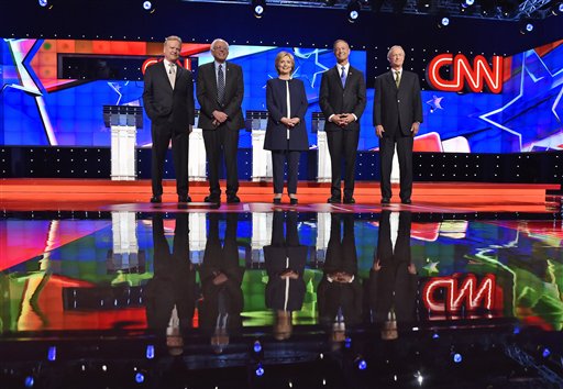 In this Oct. 13, 2015, photo, Democratic presidential candidates from left, former Virginia Sen. Jim Webb, Sen. Bernie Sanders, I-Vt., Hillary Rodham Clinton, former Maryland Gov. Martin OMalley, and former Rhode Island Gov. Lincoln Chafee take the stage before the CNN Democratic presidential debate in Las Vegas. Democratic presidential candidates gave a meaningful public nod to the Black Lives Matter movement in their first televised debate. The candidates invoked its slogan and raised the core concerns stemming from police killings of African-Americans. Protesters have articulated those concerns in disrupting some of the candidates campaign events.  (AP Photo/David Becker)