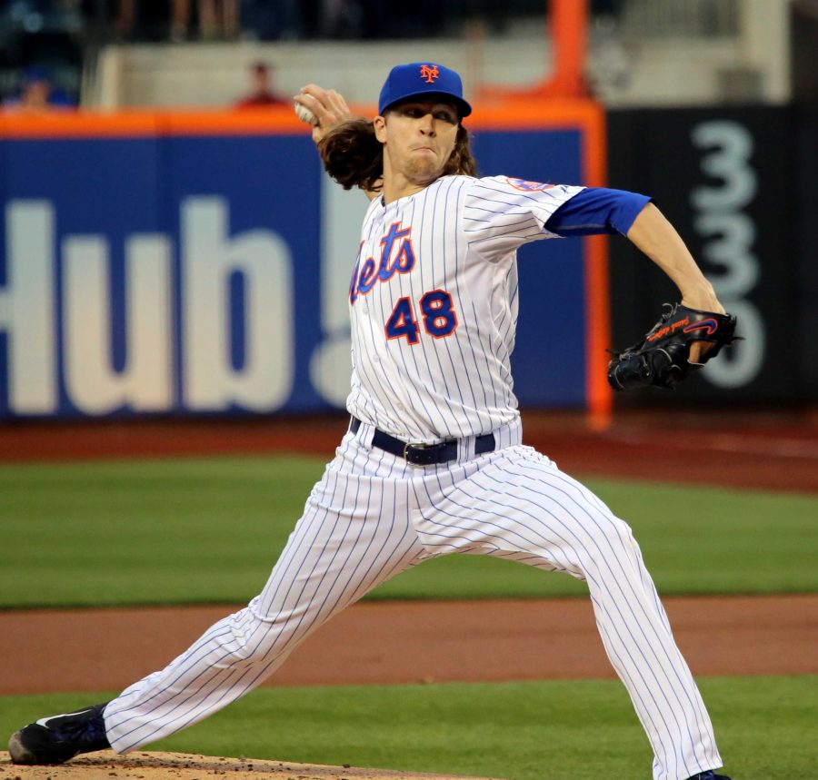 Jacob+deGrom+delivers+a+pitch+against+the+Orioles.