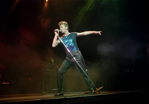Singer David Bowie performs in Hartford, Conn., Thursday, Sept. 14, 1995. The Hartford concert is the first stop for Bowie on his new tour.  (AP Photo/Bob Child)