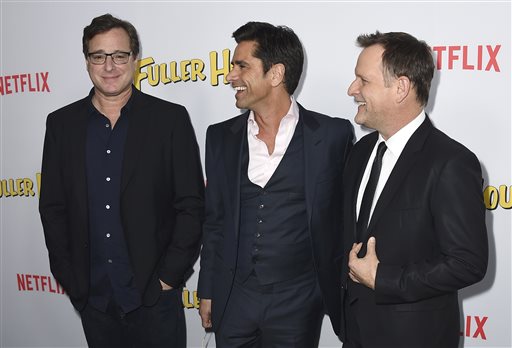 Fuller House keeps some favorite characters, like Jesse, Danny and Joey, as guest stars. Jordan Strauss/AP. 