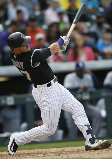 Rookie shortstop Trevor Story has been on a historic pace to start his MLB career. (David Zalubowski/AP).