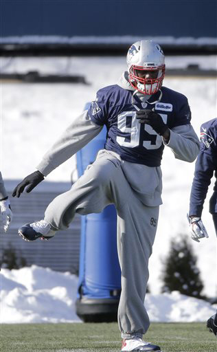 New England Patriots defensive lineman Chandler Jones warms up on the field during an NFL football practice, Wednesday, Jan. 13, 2016, in Foxborough, Mass. Jones was admitted to a hospital on Sunday and released the same day, the team said in a statement that did not elaborate on the nature of the medical issue. (AP Photo/Steven Senne)