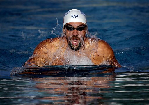 American swimmer Michael Phelps will be on the hunt for more gold at the Olympics this summer. (Matt York/AP)