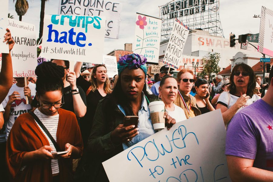 Anti-Trump protests have continued to erupt around the country, and often send the message “love trumps hate.” (Courtesy of Flickr). 