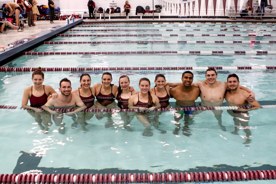 10 of the 11 senior swimmers in the pool following their final home meet. (Julia Comerford/The Fordham Ram)