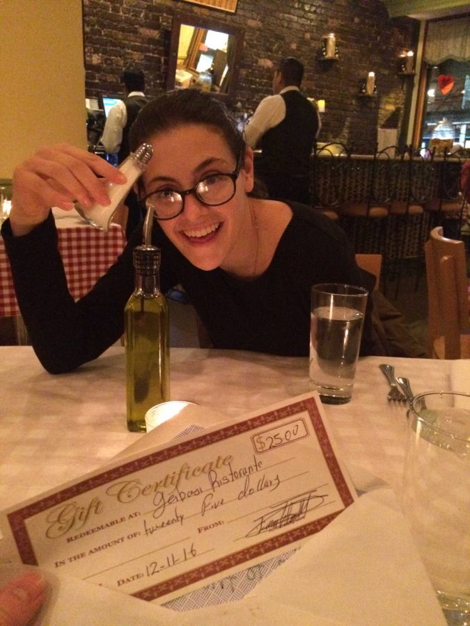 Caitlyn smiles with her one of two dinners at an Arthur Avenue classic. 