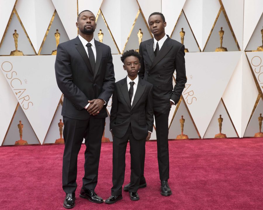 The three actors who portray Chiron in Moonlight pose together on the red carpet (Courtesy of Flickr).