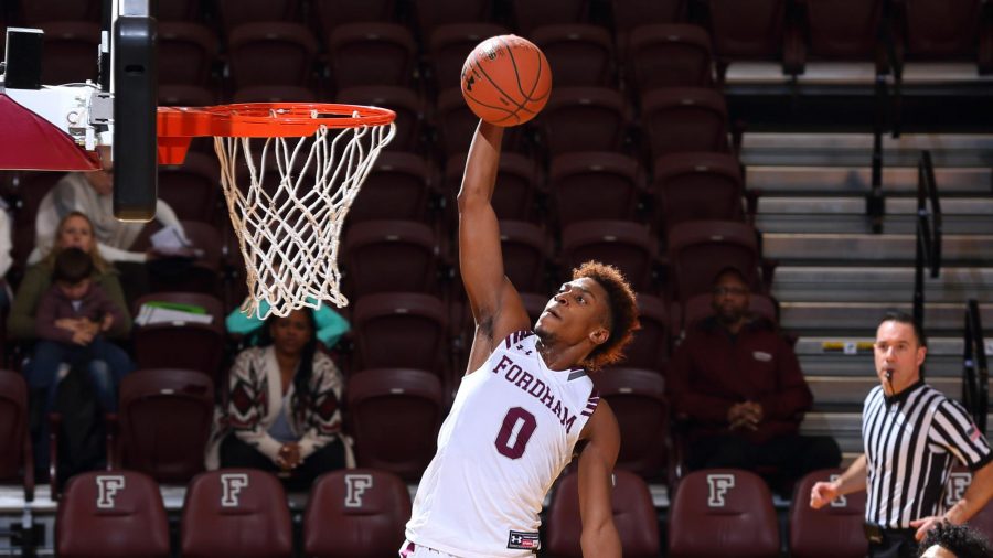 Will Tavares elevates for a dunk. Tavares is the leading scorer for Fordham, who is 6-13 and just 1-6 in the Atlantic 10. (Julia Comerford/The Fordham Ram)