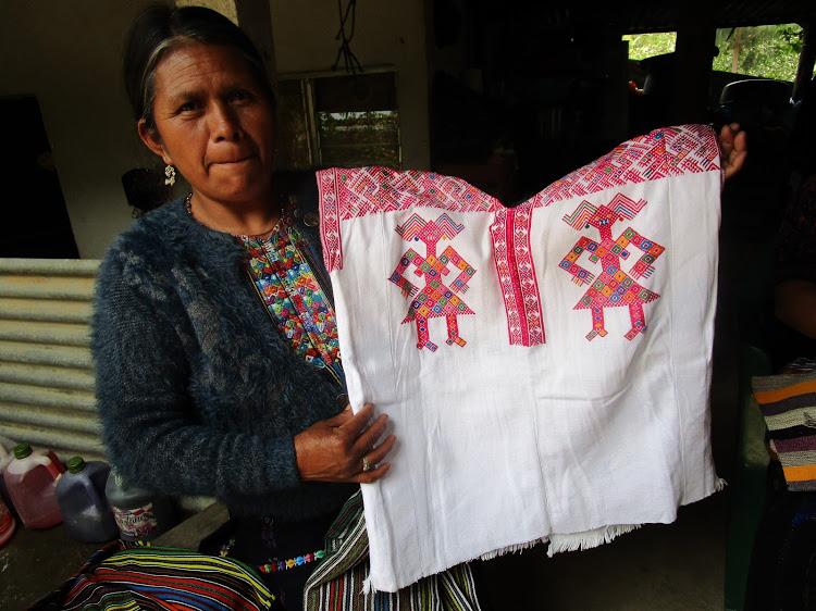 Kutsch, pictured above, studies the work of artisans in Guatemala. (Courtesy of Rosalyn Kutsch)