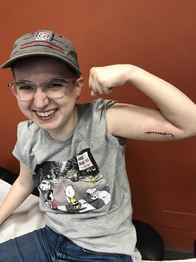 FCRH 19 Catherine Swindal gets Animo tattooed on her arm at Tuff City (Courtesy of Catherine Swindal). 