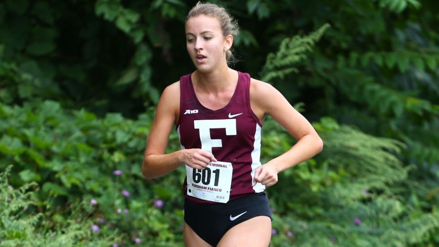 The freshman Bridget Alex running during the NYIT Invitational, which she won with a time of 18:06.0. (Courtesy of Fordham Athletics)