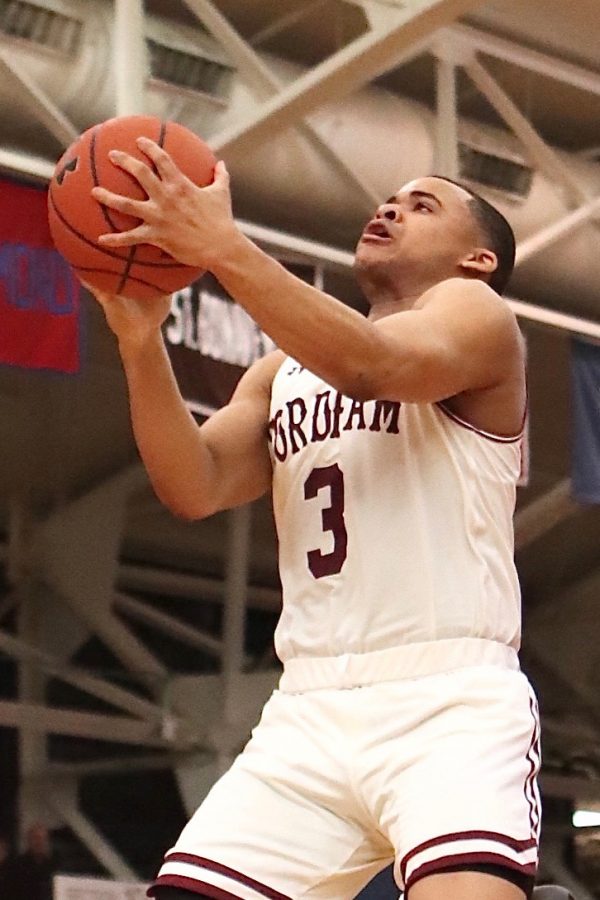 Freshman guard Nick Honor hit the a last minute three-pointer in to life Fordham over Rhode Island. (Courtesy of The Fordham Ram)