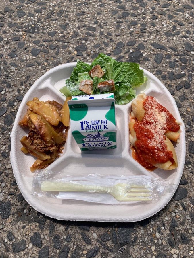 Brigaid served healthy and well balanced lunches on its food truck. Pictured above is cheese stuffed shells with marinara sauce, Caesar salad, baked apples and milk.