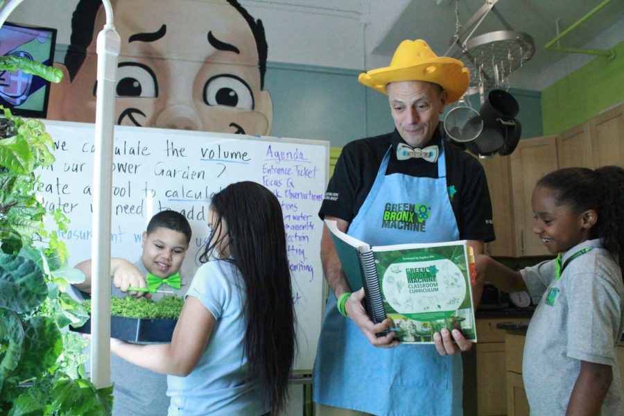 Stephen Ritz (center) founded Green Bronx Machine to help school kids learn about nutrition and growing their own food. (Courtesy of Green Bronx Machine)