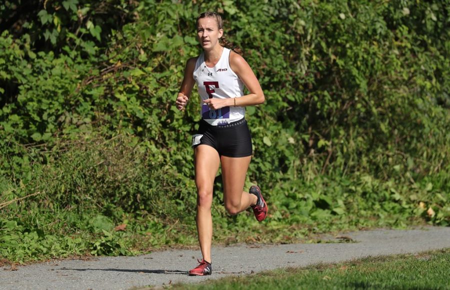 Alex (above) was again a top finisher, leading her team in its final race of the season. (Courtesy of Fordham Athletics)