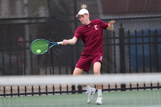 Tom Russwurm battled in the #1 spot against St. John’s. (Courtesy of Fordham Athletics)