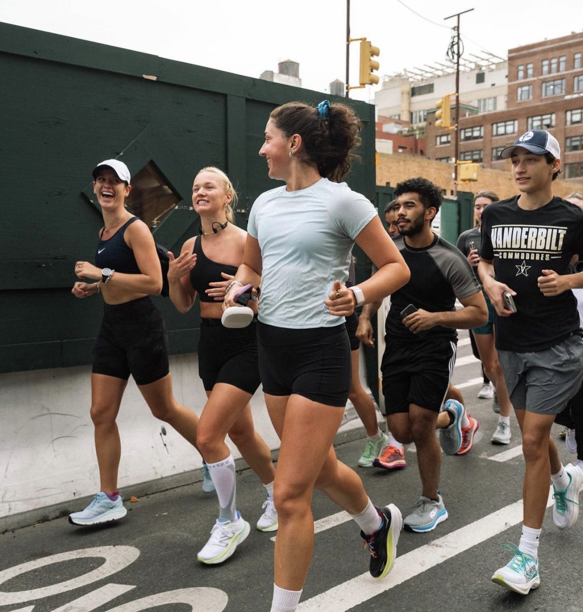 Fitness influencer Kate Glavan boosted morale at her monthly run club. (Courtesy of Instagram)