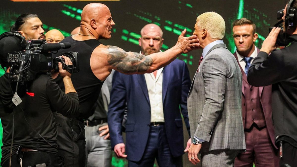 The Rock slaps Cody Rhodes at the WrestleMania press conference in Las Vegas on Feb. 8, 2024. (Courtesy of Twitter) 