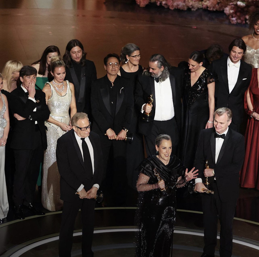 Christopher Nolan, along with the cast and crew of Oppenheimer, accept the Best Picture Oscar. (Courtesy of Instagram)