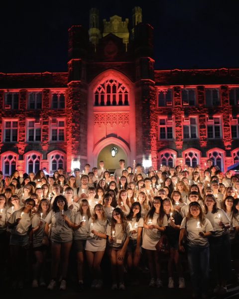 Incoming first-year students participate in orientation ceremony tradition. (Courtesy of Jessica Noce for The Fordham Ram)