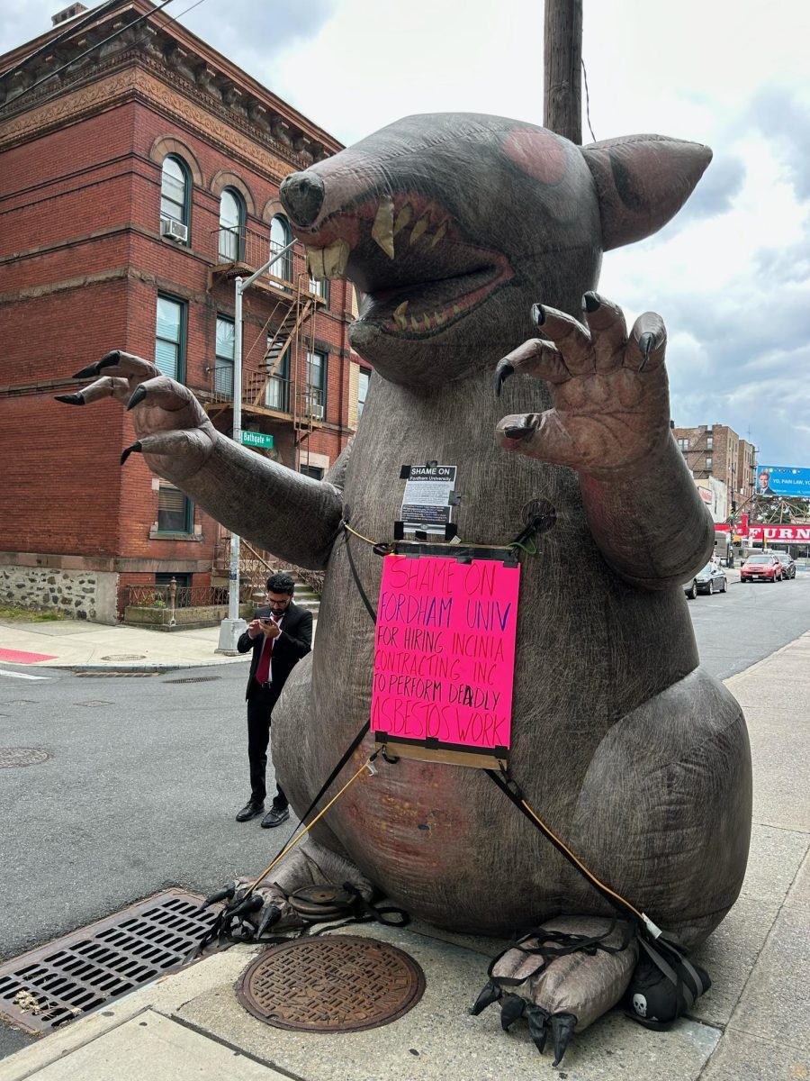 A massive inflatable rat bares its teeth just outside Fordham University's Rose Hill Campus. (Courtesy of Allison Schneider/The Fordham Ram)