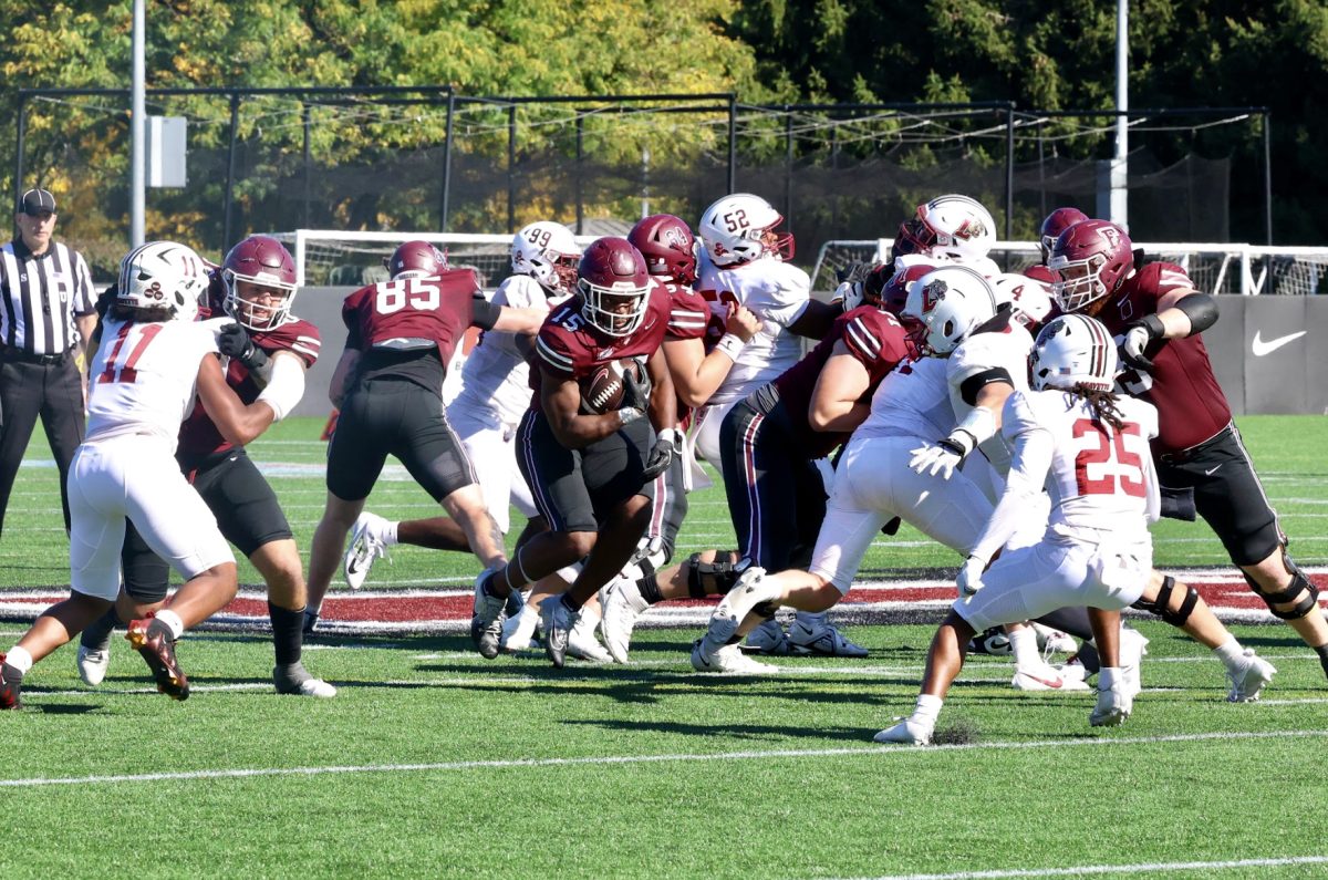 Julius Loughridge totes the rock during Fordham's hard-fought loss against Lafayette. (Courtesy of Cristina Stefanizzi/The Fordham Ram)