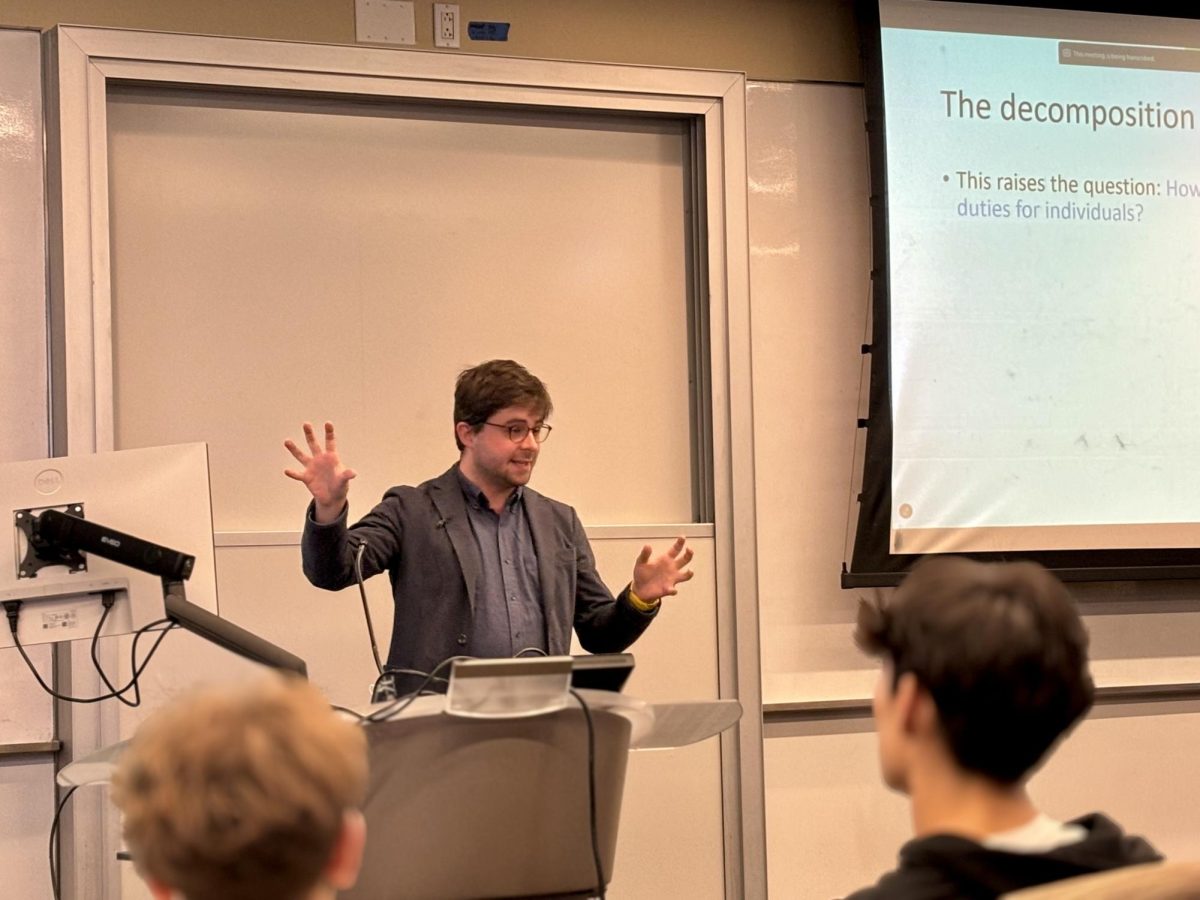 Oxford professor Samuel Mortimer hosts a talk at Gabelli School of Business. (Courtesy of Jack McDonald for The Fordham Ram)