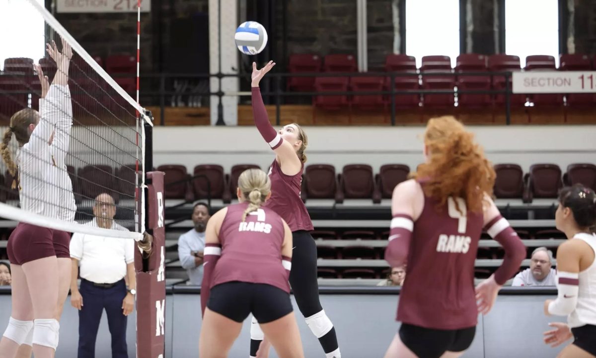 Freshman pin hitter Bridget Woodruff floats one over for Fordham. (Courtesy of Vincent Dusovic for Fordham Athletics)