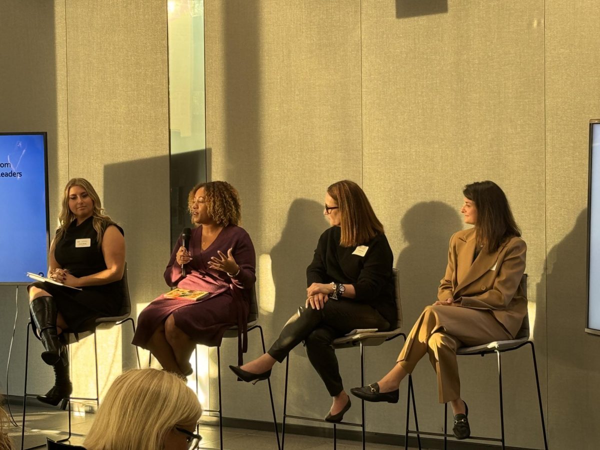 Panelists speak at a marketing event in 3 World Trade Center. (Courtesy of Sabrina Bee for The Fordham Ram)