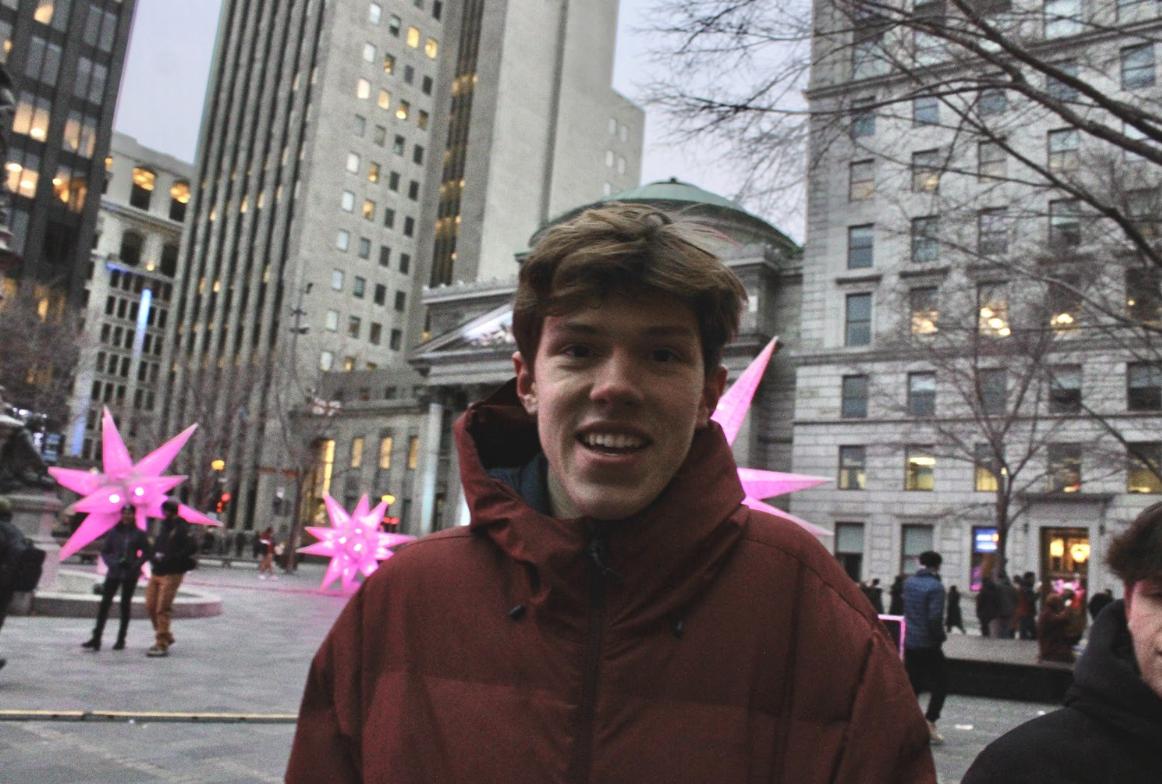 Puskorius shares a smile in Montreal on a trip. He loves traveling and experiencing different cultures. (Courtesy of Aidas Puskorius for The Fordham Ram)