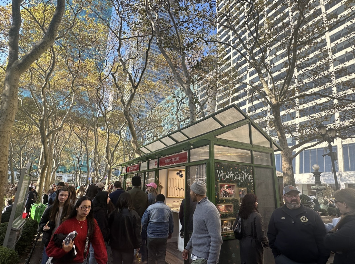 New Yorkers and Visitors alike visit the Bryant Park Christmas Village in Midtown. (Courtesy of Emma Leonardi for The Fordham Ram)