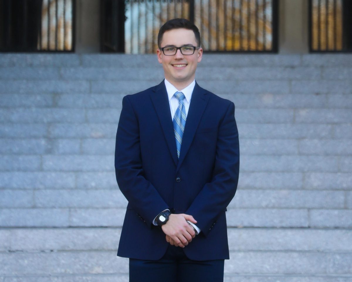 Vice President of Student Life for Fordham Rose Hill's United Student Government, Joseph DaProcida, FCRH ’25, poses on the steps of Keating Hall. (Courtesy of Jeriel Nunez for The Fordham Ram)