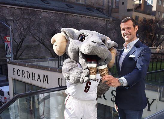 The Saxbys CEO and Ramses pose outside Lincoln Center. Sasbys has locations at 30 other universities in the United States; Fordham will be their first New York City location. (Fordham University/The Fordham Ram)