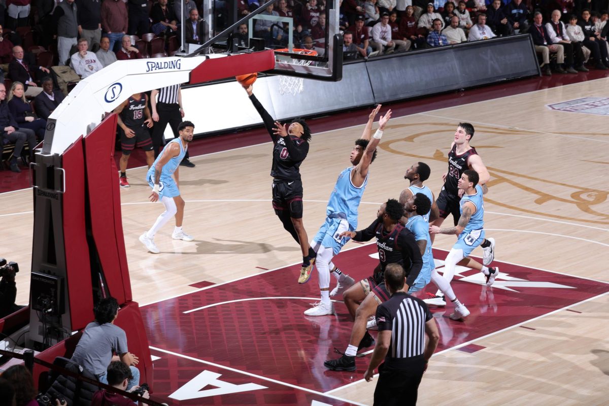 Japhet Medor drives for a layup, which will be put back by Matt Zona for the one-point lead with 2.3 seconds left on the clock (Courtesy of Fordham Athletics).    