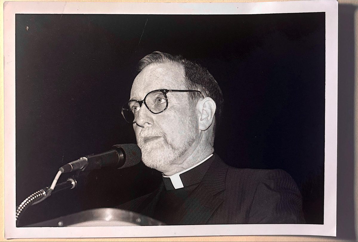 Fr. Ryan pictured delivering a lecture. (Courtesy of Augustine Preziosi for The Fordham Ram)