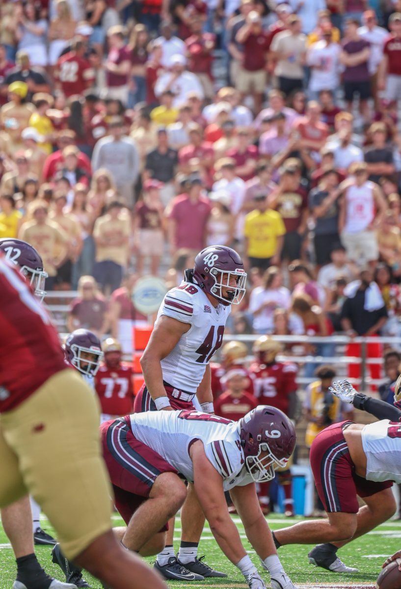 Fordham Linebacker James Conway eyes the opposing quarterback pre-snap.
