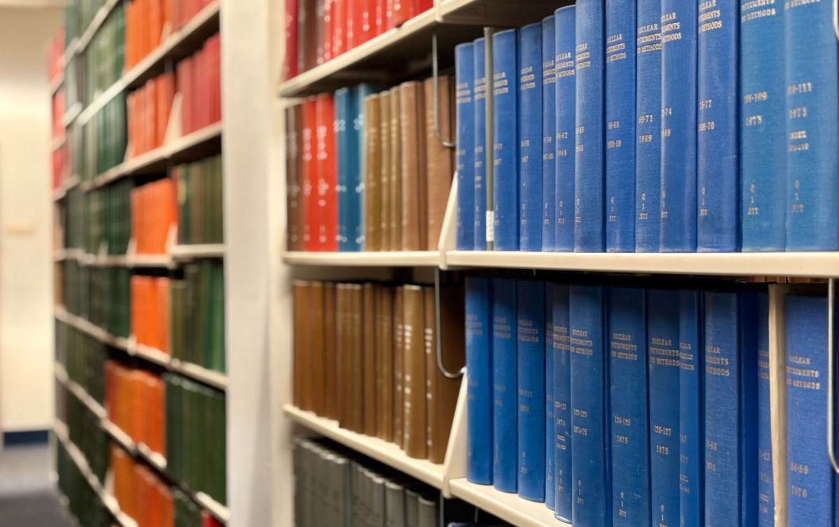 A spread of science texts on the fourth floor collection at Walsh Library. (Jack McDonald / The Fordham Ram)