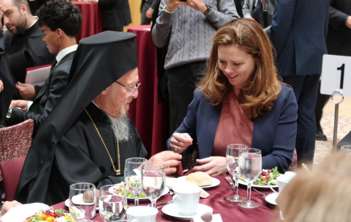 President Tetlow gives the Presidential Medal to the Patriarch at a private reception hosted in McShane. (Sidney Blasco/The Fordham Ram) 