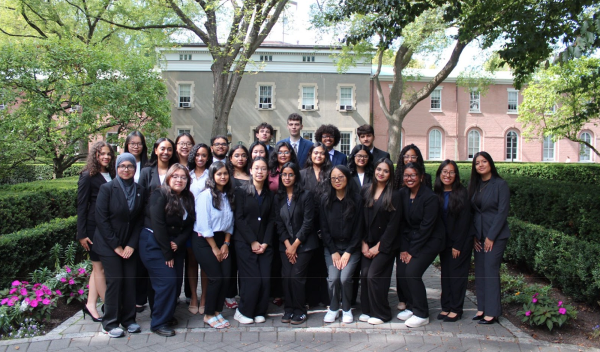 CSA members pose for a photo near the Carolyn Dursi Cunniffe Fountain. (Analisa Brown-Beebe for The Fordham Ram)