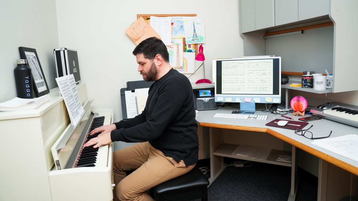 Daniel Ott in his office in Lowenstein Center at Fordham's Lincoln Center Campus. (Courtesy of Fordham Now). 