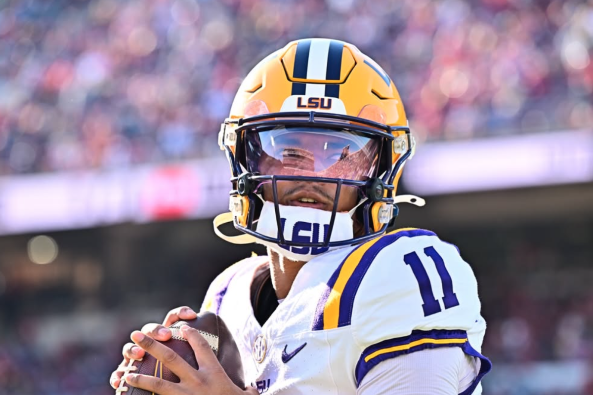 LSU quarterback Michael Van Buren Jr. pictured above in LSU’s tradition white home uniform.