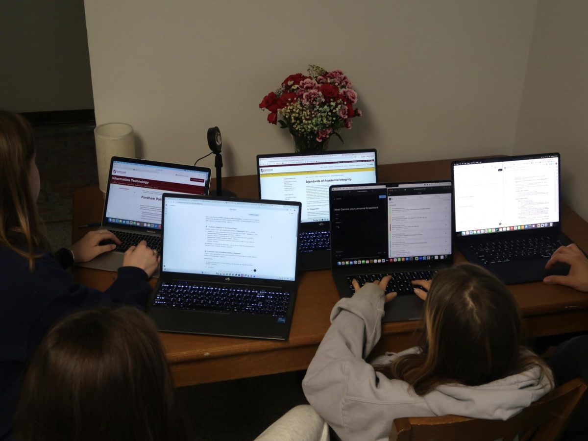 Students reading Fordham’s AI Policy and using generative artificial intelligence for class assignments.