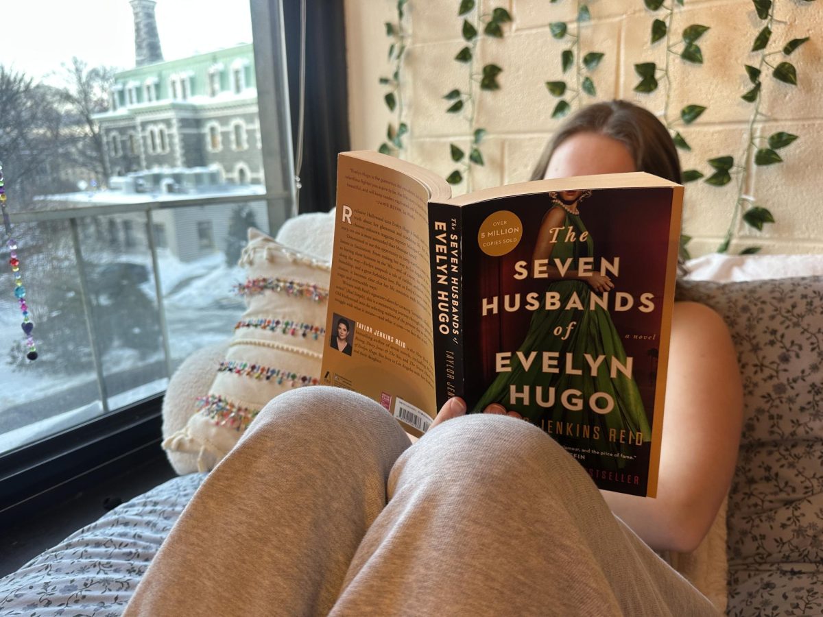 Reinders roommate reading her favorite book by Jenkins Ried.