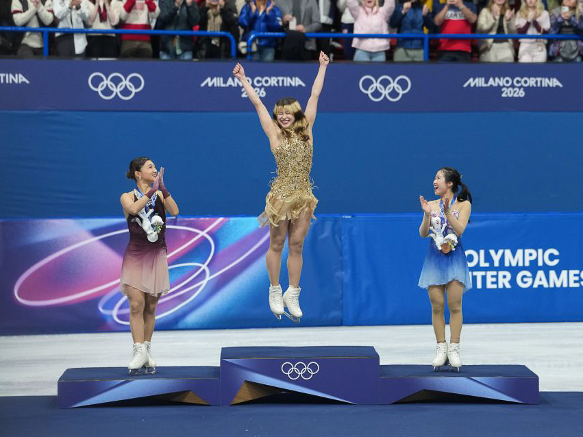 Team USA figure skater Alysa Liu celebrates after winning a gold medal.